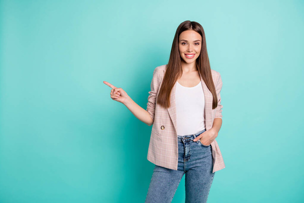 Portrait of her she nice-looking attractive lovely pretty content cheerful straight-haired girl pointing aside ad advert isolated over bright vivid shine blue green teal turquoise background - Foto, Bild
