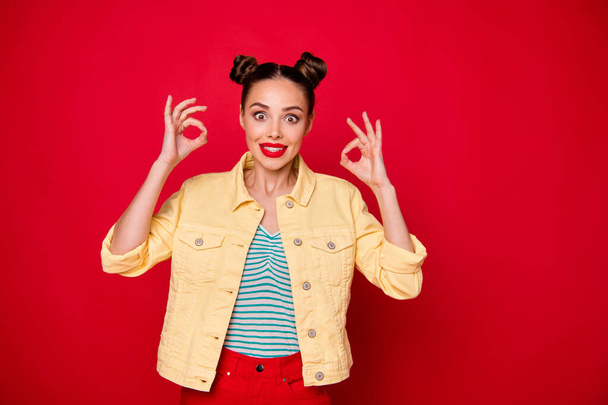 Photo of pretty lady showing okey symbol casual stylish outfit isolated red background - Φωτογραφία, εικόνα