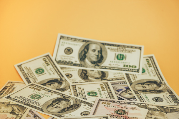 Dollars Close up Concept. American Dollars Cash Money on a yellow background. - Φωτογραφία, εικόνα