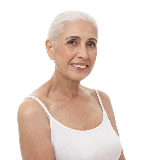 Portrait of beautiful mature woman on white background - Foto, afbeelding
