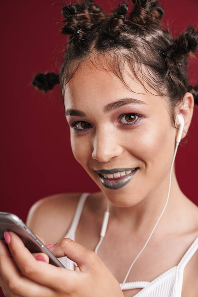 Image of attractive punk girl with bizarre hairstyle and dark li - Valokuva, kuva