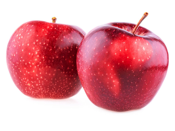 rote Äpfel. zwei rote Äpfel in Nahaufnahme auf weißem Hintergrund - Foto, Bild
