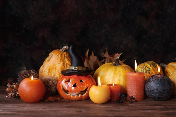 Halloween pumpkin decor with candles - 写真・画像