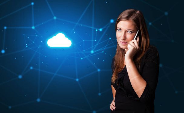 Person talking on the phone with cloud technology concept - Foto, Imagem