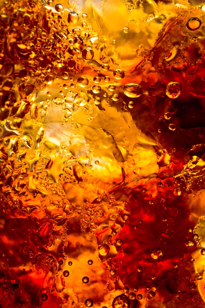 cola drink with ice cubes texture and bubble  - Photo, Image