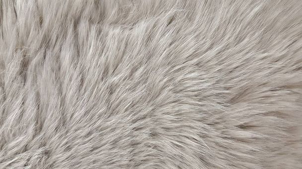 Close up image of fake white animal fur with long hair and rich textures. - Photo, Image