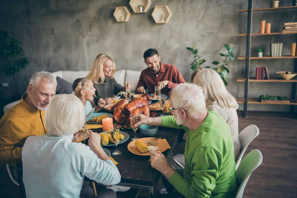 Portrait of nice idyllic cheerful big full family couples eating domestic tasty yummy meal dishes feast gratefulness gathering tradition atmosphere season modern loft industrial style interior house - Photo, Image