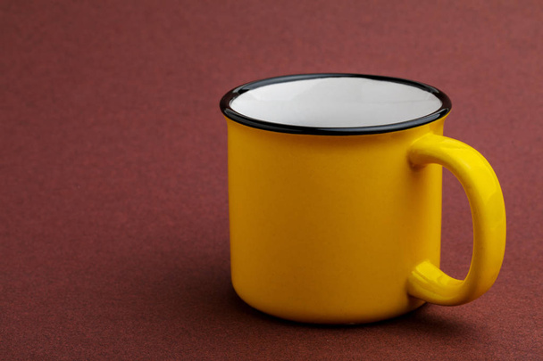 iron mug, on red background. - Zdjęcie, obraz