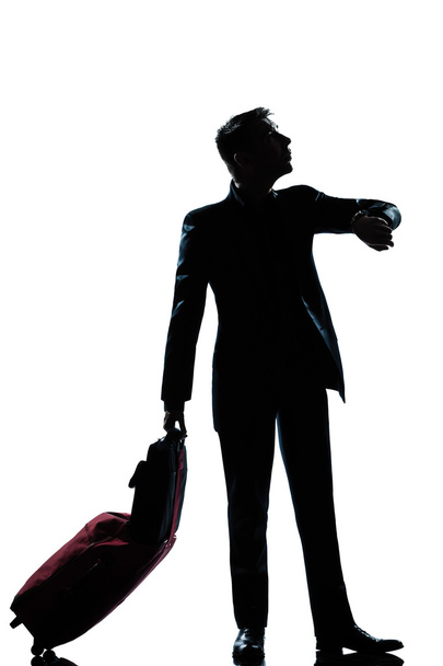 silhouette man business traveler man checking the time - Fotografie, Obrázek