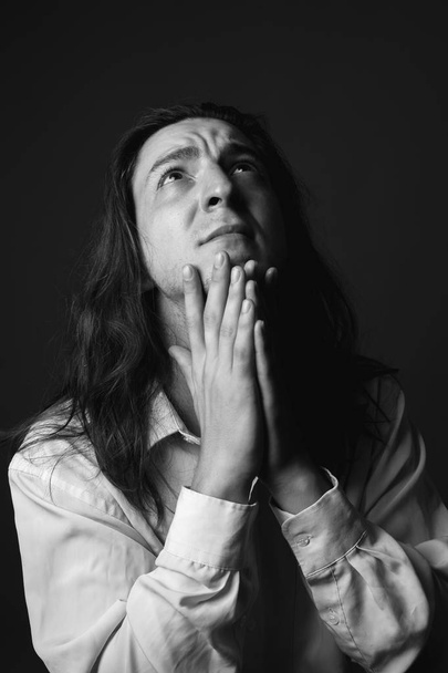 Portrait of depressed man with long hair. Black and white - Fotoğraf, Görsel