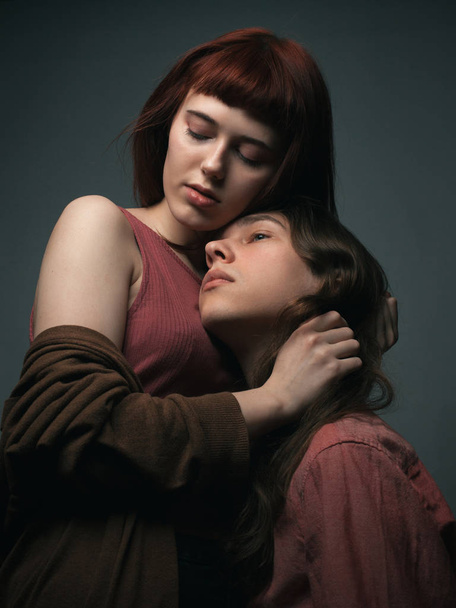 Portrait of young couple in love. Studio - Fotoğraf, Görsel