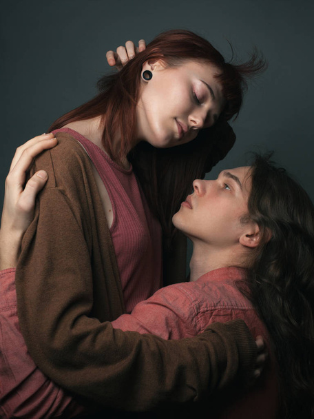 Young couple in love hugging. Studio - Valokuva, kuva