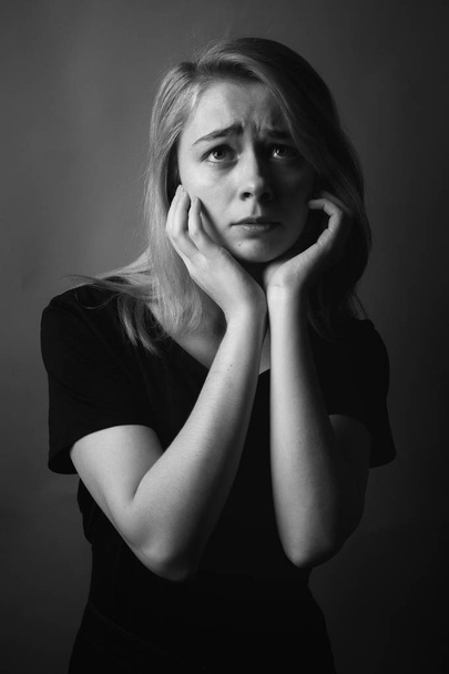 Portrait of sad beautiful young woman. Black and white. - Fotografie, Obrázek