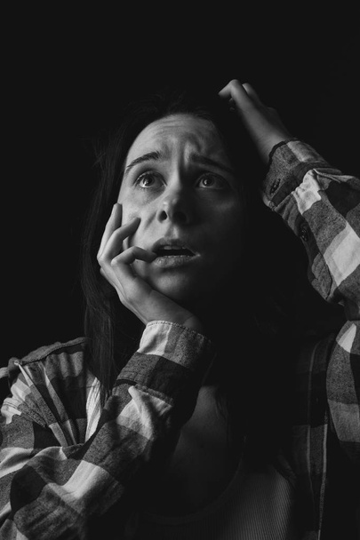 Fear expression of young woman - Фото, изображение
