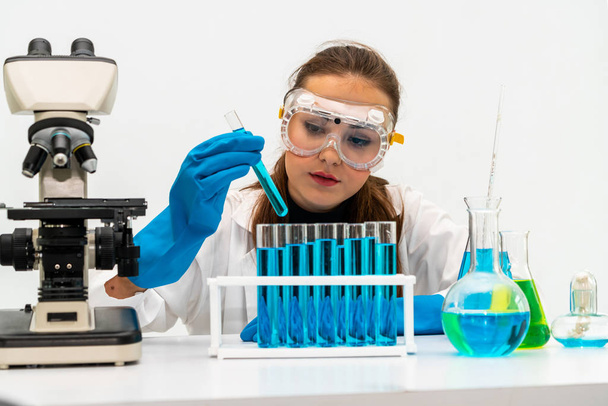 Woman scientist working in chemist laboratory. - Fotografie, Obrázek