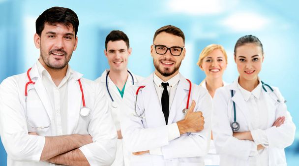 Professional doctor working in hospital office or clinic with other doctors, nurse and surgeon. - Photo, Image