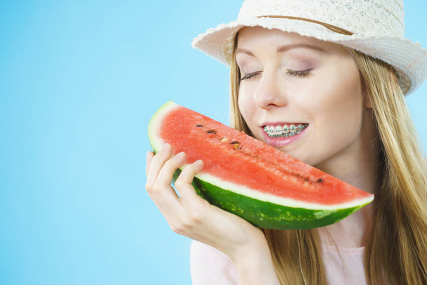 woman holding watermelon fruit - Фото, изображение