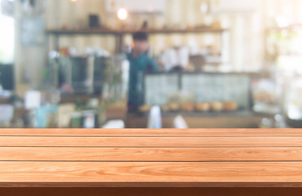 Tavolo in legno sfocato sullo sfondo del ristorante moderno
 - Foto, immagini