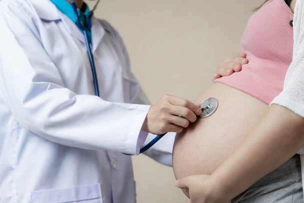Pregnant Woman and Gynecologist Doctor at Hospital - Photo, Image