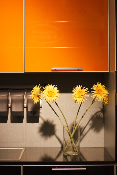 Modern kitchen with flowers - Фото, зображення