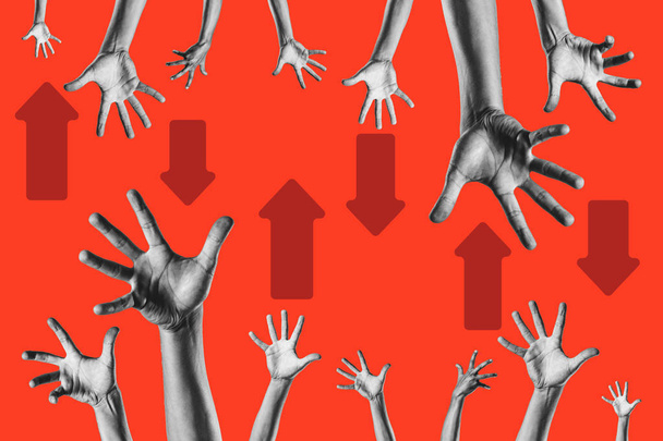 csoport kéz jelenik meg fel és le, és nyilak közöttük szemben piros háttér - Fotó, kép