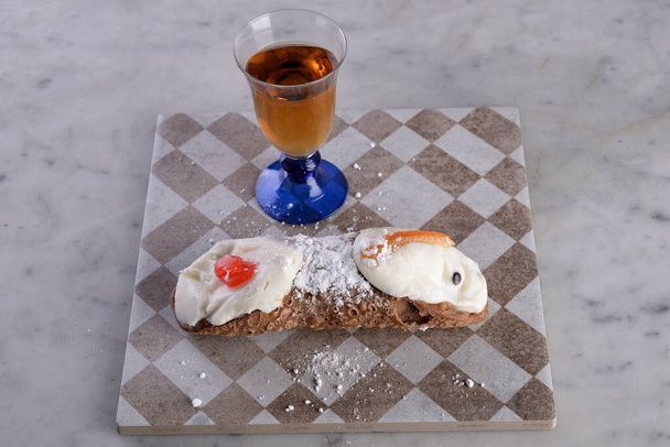 Typical Sicilian sweet cannolo with ricotta and candied fruit an - Photo, Image