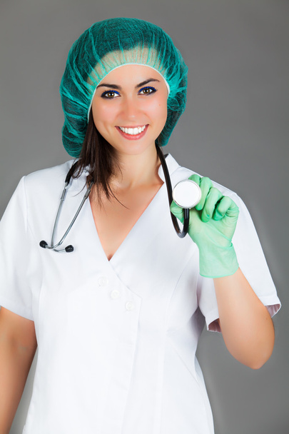 kobieta lekarz na szarym tle - Zdjęcie, obraz