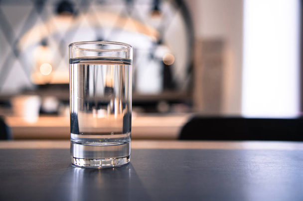glass of water on the table background - Valokuva, kuva