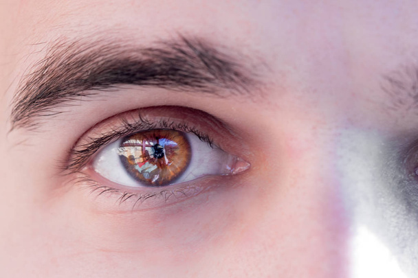 close-up of a young man's eye - Fotoğraf, Görsel