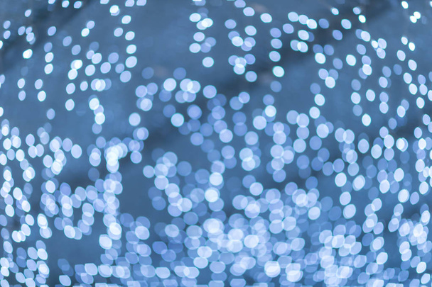 blue bokeh with shining and blurred circles.  Abstract background - 写真・画像