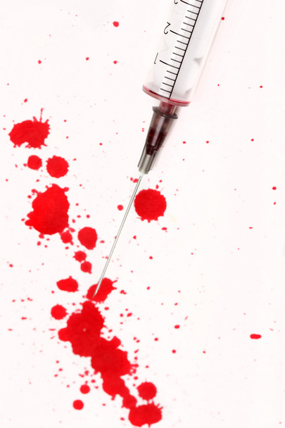 Blood with syringe - Foto, Imagen