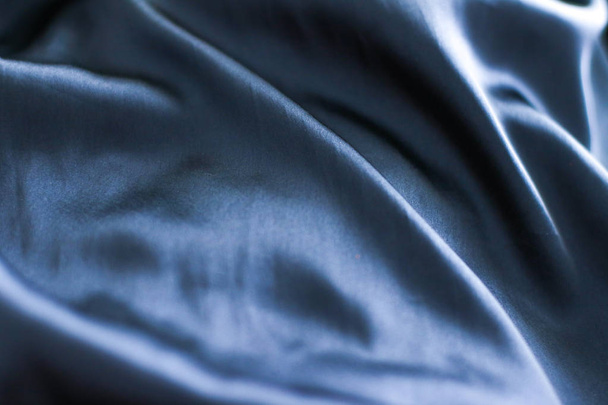 Luxury dark blue soft silk flatlay background texture, holiday g - Фото, изображение