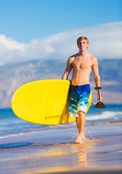 Man on Stand Up Paddle Board - 写真・画像