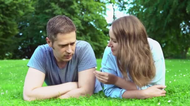 Man and woman talking in the summer park. - Footage, Video