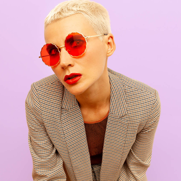 Blonde model with short hair in fashion glasses. Vintage style - Zdjęcie, obraz