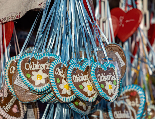 typical souvenir at the oktoberfest in munich - a gingerbread heart - lebkuchenherz - Photo, Image