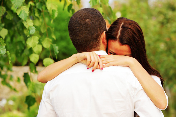 Young couple in love hugging in the park - Foto, Imagem
