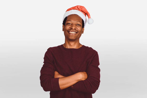 happy man in christmas hat. - Foto, afbeelding