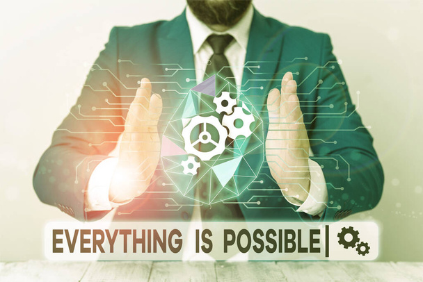 Text sign showing Everything Is Possible. Conceptual photo Any outcome could occur Anything can happen Male human wear formal work suit presenting presentation using smart device. - Photo, Image