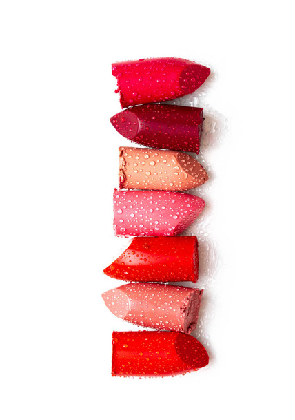 Collection of broken lipstick make up on white background. Make up artist, beauty salon, beauty blog concept - Photo, Image