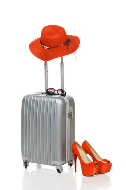 Silver suitcase with red straw hat and shoes - Foto, Imagen