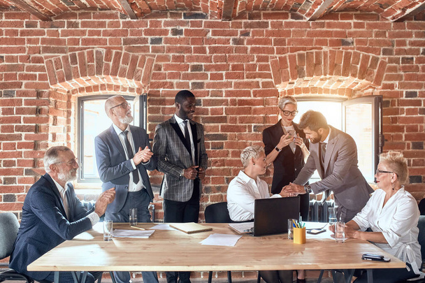 Group of business people brainstorming together in meeting room - Φωτογραφία, εικόνα