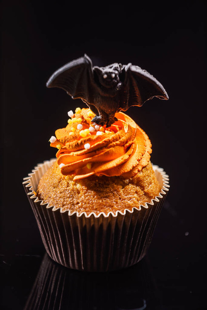 Halloween dessert on the black background - Фото, зображення