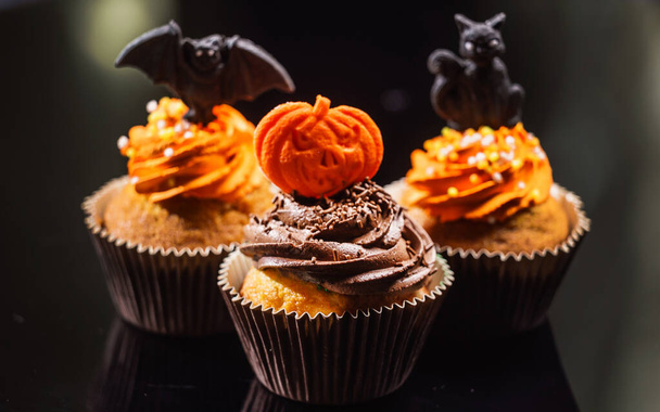 Halloween dessert on the black background - 写真・画像