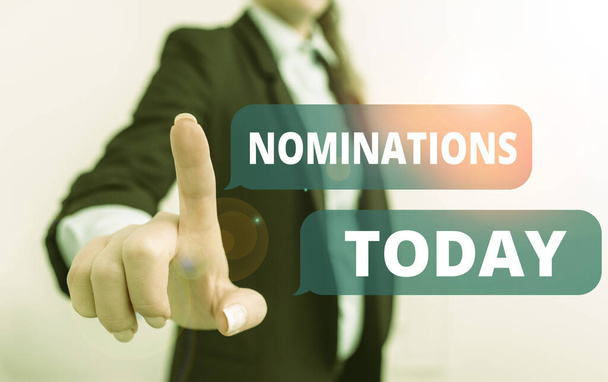 Text sign showing Nominations. Conceptual photo the act of officially suggesting someone for a job or position Digital business in black suite concept with business woman. - Photo, Image