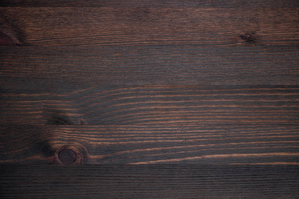 Деревянная текстура драматический свет, естественный узор. Деревянный коричневый бак
 - Фото, изображение