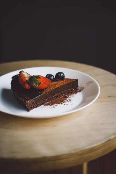 Vegan raw chocolate flourless piece of cake  - Zdjęcie, obraz