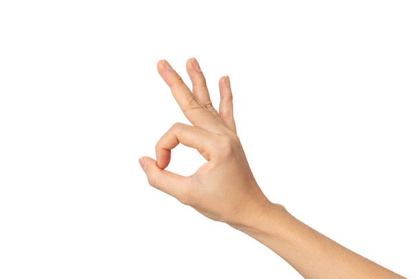 Жінка рука добре знак на білому ізольованому фоні з відсічним контуром
 - Фото, зображення
