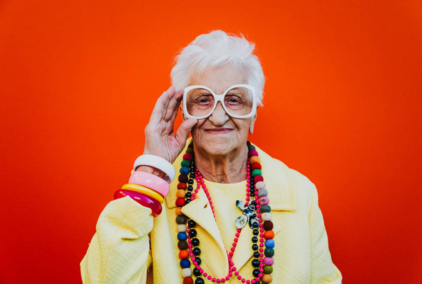 Funny grandmother portraits. Senior old woman dressing elegant f - Фото, зображення