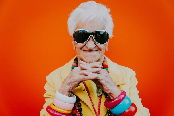 Funny grandmother portraits. Senior old woman dressing elegant f - Фото, зображення
